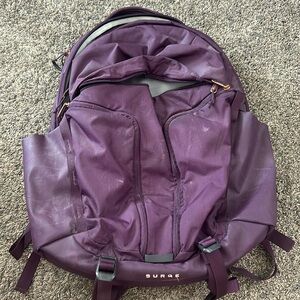 purple north face surge backpack